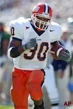 Illinois' Pierre Thomas scores a second-quarter touchdown on a 23-yard rush against Michigan State.