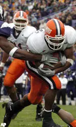 Pierre Thomas slips past Northwestern defenders for his first touchdown of the day.