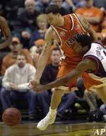 Deron Williams, left, and Gonzaga guard Piere Marie Altidor-Cespedes battle for a loose ball.