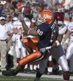 Receiver Franklin Payne battles for the ball with an Indiana defender.