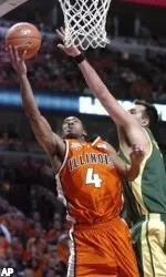 Luther Head drives to the basket as Oregon's Ian Crosswhite defends during the second half.