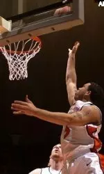 Deron Williams scores against Longwood University in the first half.