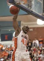 Roger Powell Jr. scores during the first half against Cincinnati.