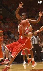 Wisconsin's Ray Nixon goes off balance trying for a shot as Illinois' Roger Powell defends during second half action Wednesday at Assembly Hall. Illinois topped the 10th-ranked Badgers 65-57.