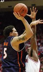 Illinois' Deron Williams puts up a shot over Indiana's A.J. Moye during the second half in Bloomington, Ind.