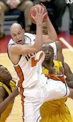 James Augustine hauls down a rebound against Murray State in the first half.