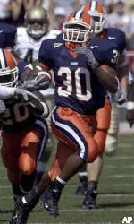 Illinois' Pierre Thomas scores on a 99-yard kickoff return on the first play of the Illini's 30-27 win over Western Michigan.