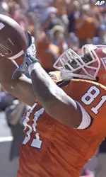 Anthony McClellan celebrates a first-half touchdown against Purdue on Saturday.