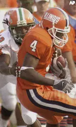 Receiver Ade Adeyemo battles Florida A&M's LaJuan Walker.