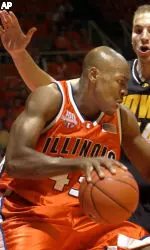 Roger Powell drives against Iowa's Greg Brunner.