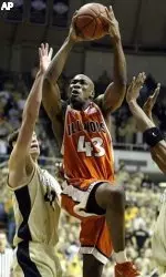 Forward Roger Powell gets a bucket over Purdue's Matt Kiefer in the first half.