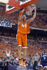 Senior James Augustine tallied game highs of 14 points and 11 rebounds to lead the blue team to victory over the orange Friday night at the Assembly Hall.