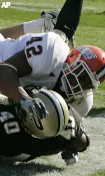 Illinois' Kevin Mitchell and J Leman tackles Purdue's Kory Sheets during the second quarter. (AP Photo/Darron Cummings)
