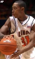 Illinois freshman Jamar Smith looks to pass against Coppin State. (AP Photo/Robin Scholz)