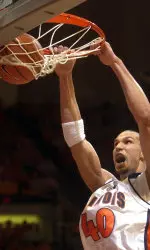 James Augustine stuffs the ball during the first half against Tennessee Martin. (AP Photo/Robin Scholz)