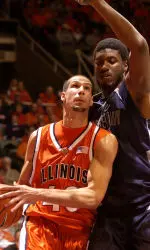James Augustine readies to shoot as Georgetown's Roy Hibbert defends in the first half.
