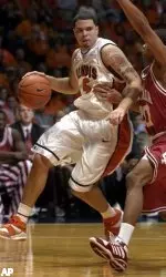 Deron Williams drives around Indiana's A.J. Ratliff.