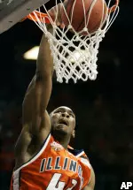 Roger Powell slam dunks against Wisconsin-Milwaukee in the first half.