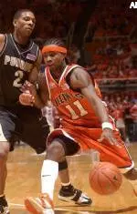 Dee Brown drives to the hoop on his way to a career-high 27 points in the Illini victory Thursday.