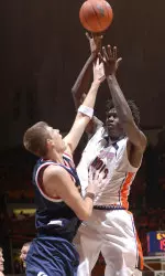 Warren Carter is fouled by Belmont's Keaton Belcher.
