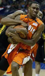 Jamar Smith struggles with Missouri's Leo Lyons for the ball in the first half.