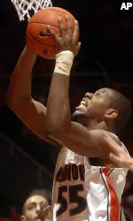 Shaun Pruitt goes up for a shot against Idaho State during thier college basketball game. (AP Photo/Robin Scholz)
