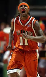 Dee Brown screams to the crowd after hitting a three point shot to break a tie with Northwestern in second half NCAA college basketball action. (AP Photo/John Dixon)