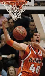 Illinois' James Augustine reacts to his dunk over Washington in the second half of a second-round game in the NCAA basketball tournament Saturday, March 18, 2006, in San Diego. (AP Photo/Denis Poroy)