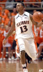 Jeffre Jordan (13) brings the ball up during the second half. (AP Photo/John Dixon)