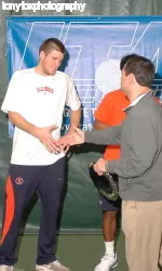 Senior Ryan Rowe accepts his runner-up trophy at the ITA National Indoor Championships.