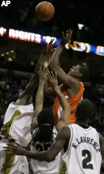 Shaun Pruitt, top right, puts up one in a sequence of shots with about 35 seconds left