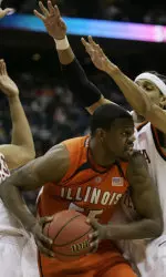 Shaun Pruitt drives against Virginia Tech's Deron Washington and Coleman Collins during the first half. (AP Photo/Tony Dejak)