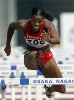 Canada's Perdita Felicien clears a hurdle in a heat of the Women's 100m Hurdles at the World Athletics Championships in Osaka, Japan. (AP Photo/Anja Niedringhaus)