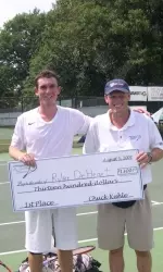 Former Illini Ryler DeHeart accepting his winnings at the Decatur Futures last weekend.