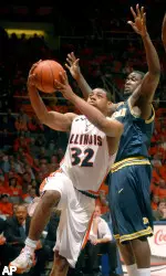 Demetri McCamey drives to the basket during the first half.
