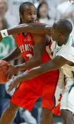 Michigan State's Travis Walton pressures Chester Frazier during the first half.