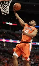 Demetri McCamey get a fast-break layup during Illinois' 68-58 win over Hawaii on Monday.