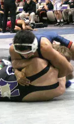 No. 9 Gabe Flores earned a pin against Michigan's Michael Watts in 4:05 on Friday.