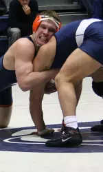 No. 17 John Dergo toughed out a 6-5 win over No. 16 Dave Erwin at 174 to seal No. 15 Illinois' 18-15 upset win over No. 8 Penn State