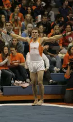 Freshman Roger Pasek captures floor and vault titles against Illinois-Chicago.