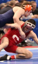 No. 2 seed Jimmy Kennedy earned his first All-America honor with an 10-8 sudden-victory win over Cornell's seventh-seeded Mike Grey.