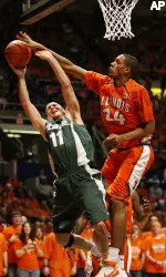 Mike Davis blocks Michigan State's Drew Neitzel. (AP Photo/The Daily Illini, Brad Vest)