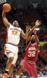 Demetri McCamey drives to the basket ahead of Indiana's Broderick Lewis in the first half. (AP Photo/John Dixon)