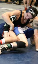 Mike Poeta scored a 20-4 technical fall in his first match of the season to lead Illinois to a 26-19 win over West Virginia.