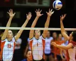 Johannah Bangert (left) tied Illinois' single-match block assists record with 13 vs. Purdue.