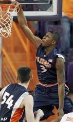Illinois guard Brandon Paul, right, dunks against Clemson. (AP)