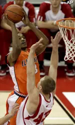 Alex Legion shoots over Wisconsin's Kevin Gullikson during the first half Thursday in Madison.