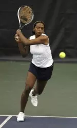 Junior Kristina Minor clinched the morning match for the Illini against the UIC Flames.