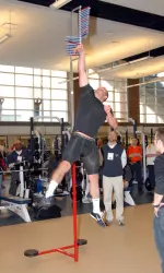 Brit Miller does the vertical leap in front of NFL scouts at Pro Timing Day on Wednesday.