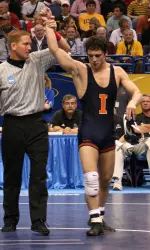 Second-seeded Mike Poeta was one of five Illini to advance to the second round, as he defeated West Virginia's Ryan Goodman, 14-5.